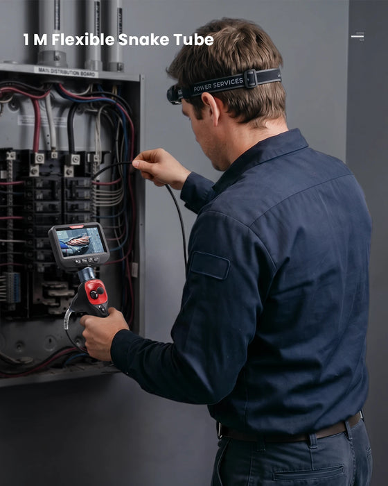 1m flexible snake tube feeding into an electrical distribution board during a live inspection
